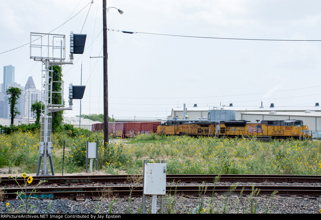 A manifest turns onto the Houston West Belt Subdivision at Tower 26